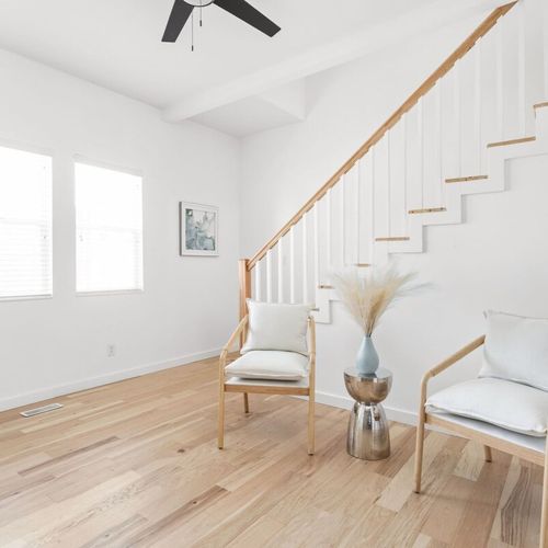 Bright and airy space perfect for relaxation and conversation, featuring chic decor!