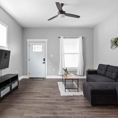 Living room with seating that doubles as a bed