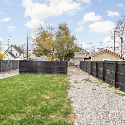 Backyard with fenced in parking. Enough to fit 1-2 cars