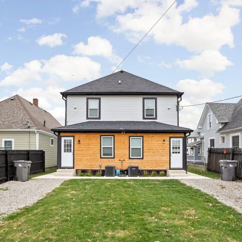 Backyard with fenced in parking. Enough to fit 1-2 cars