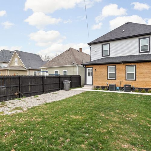Backyard with fenced in parking. Enough to fit 1-2 cars