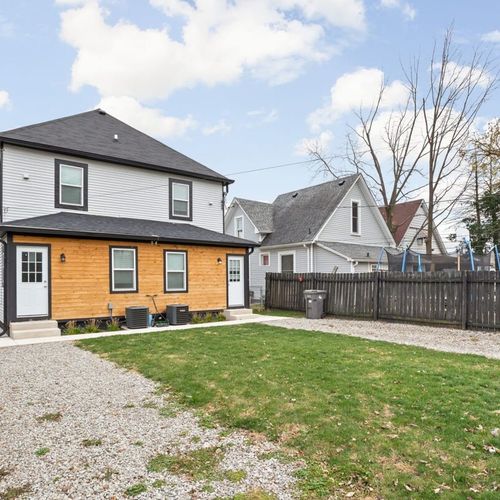 Backyard with fenced in parking. Enough to fit 1-2 cars
