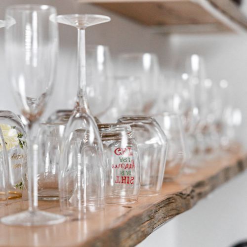 Our collection of wine glasses doubles as charming decorative accents, adding both elegance and personality to the space.
