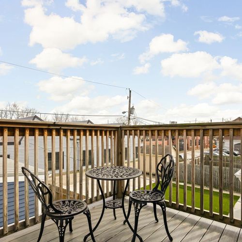 Step onto our welcoming porch to enjoy the outdoor view. Complete with a coffee table and comfortable seating, it's the perfect spot to unwind and take in the scenery.