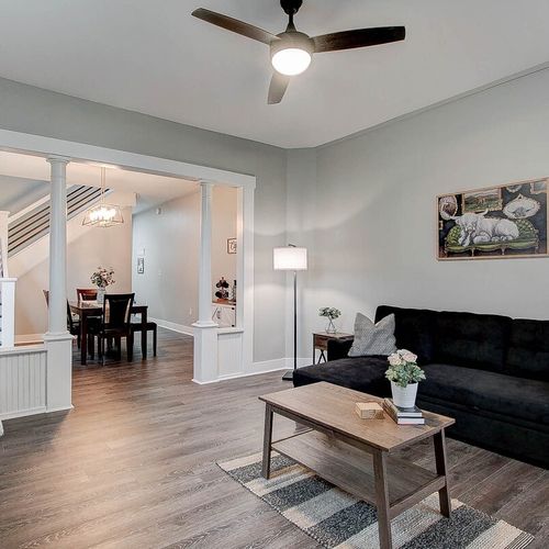 Enjoy the comforts of our living room with ample seating that doubles as a bed.