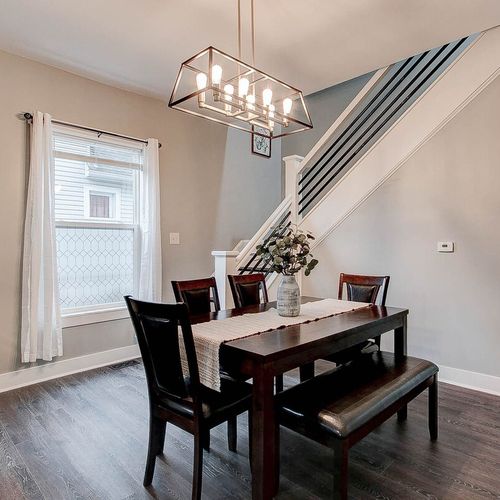 Dining room with seating for 7. Stairs to the bedrooms