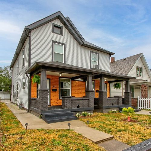 Front yard with a sidewalk to your private parking in the back