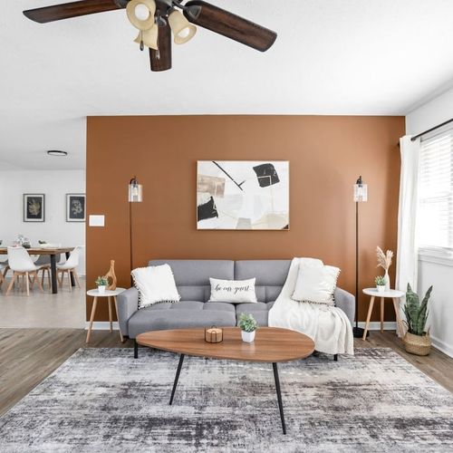 Living Room: Bright and airy space perfect for relaxing with friends or catching up on shows!