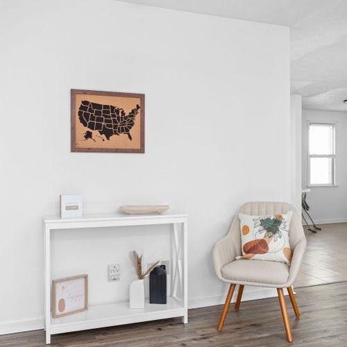 Living Room: Bright and airy space perfect for relaxing with friends or catching up on shows!