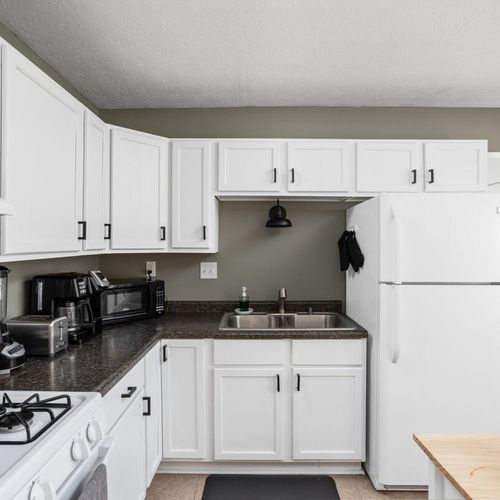 Kitchen: Modern design meets functionality with bright spaces and sleek appliances for culinary creativity!