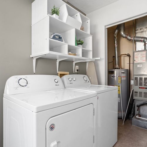 Laundry Room: Convenient space with modern appliances and storage for your washing needs!