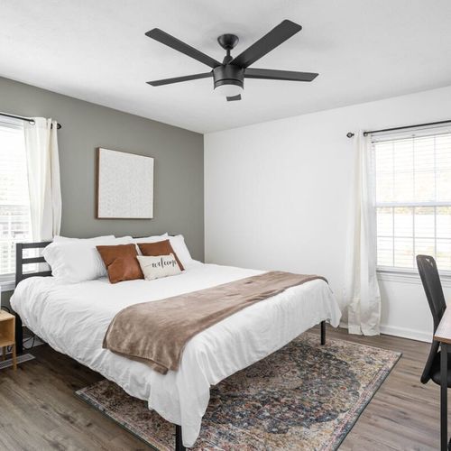 Bedroom Retreat: Bright and airy with a queen bed, workspace, and tranquil decor for ultimate relaxation!