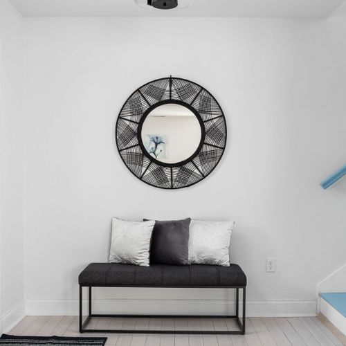 Entryway: Modern design meets comfort, welcoming you with sleek furniture and artistic flair!