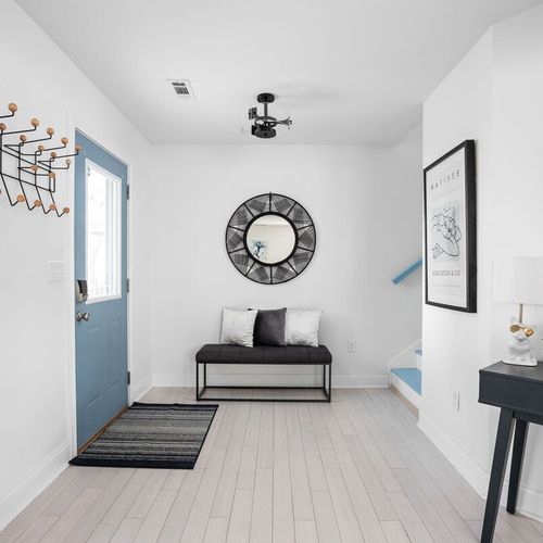 Foyer: Bright and inviting entrance with stylish decor, perfect for your Indianapolis getaway!