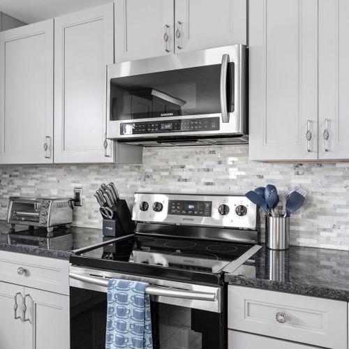 Kitchen: Whip up culinary delights in this stylish, fully equipped kitchen with sleek appliances!