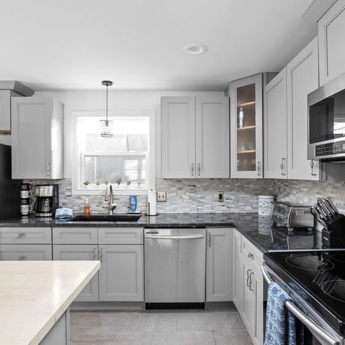Kitchen: Whip up culinary delights in this stylish space with sleek finishes and modern appliances