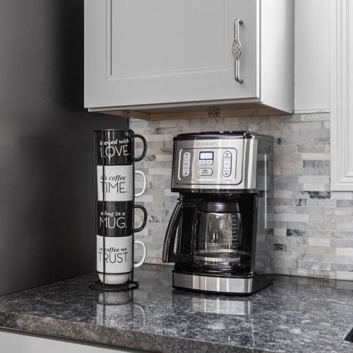 Kitchen: Brew your morning magic with our gourmet coffee station and chic mugs!