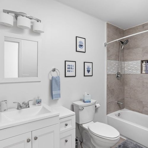 2nd Full Bathroom: Stylish fixtures and calming decor create a serene space for your rejuvenation!