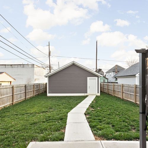 Backyard: Spacious fenced yard perfect for playful pups and sunny afternoon BBQs!