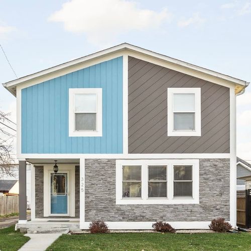 Exterior View: Bright, modern façade with stone accents invites you to your Indianapolis getaway!