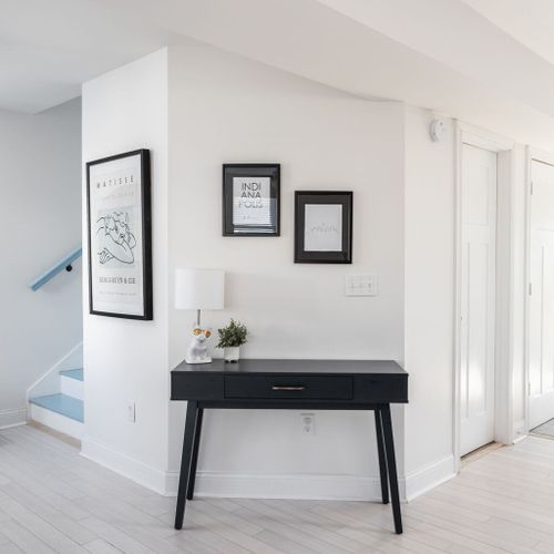 Entryway: Modern design meets comfort, welcoming you with sleek furniture and artistic flair!