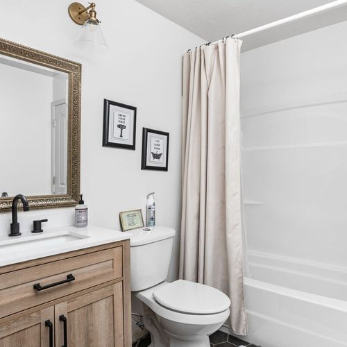 Indulge in a moment of relaxation as you step into our clean, thoughtfully decorated bathroom. Discover a tranquil haven for self-care, equipped with basic toiletries and clean, fresh towels, ensuring a refreshing and rejuvenating experience.