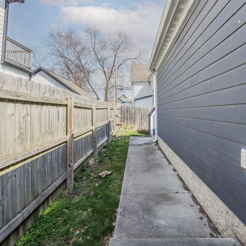 Our property features a fenced sidewalk, providing a secure and pleasant path for your leisurely walks or strolls.