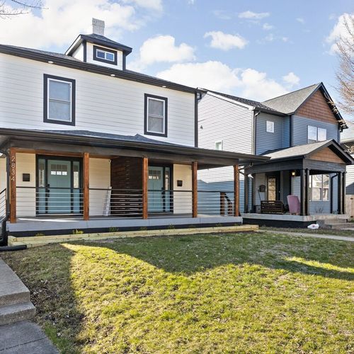 Exterior: Step into modern elegance with stylish architecture and inviting porch views!