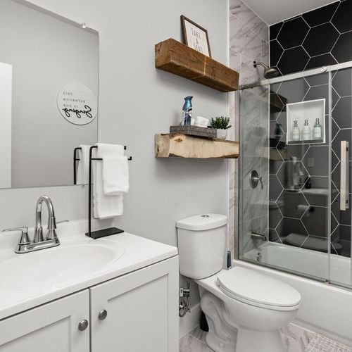 Bathroom: Modern elegance meets functionality with sleek fixtures and stylish decor for your retreat!