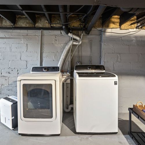 Laundry Room: Modern appliances make washing a breeze during your Indianapolis getaway!