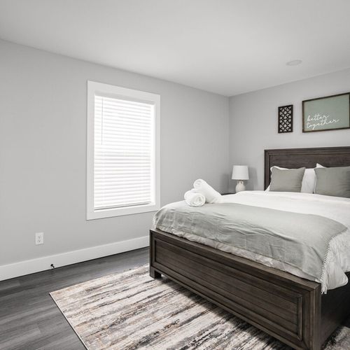 Bedroom: Bright and inviting oasis with a queen bed, stylish decor, and calming views!