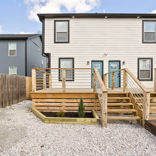 Backyard: Enjoy sunny days on the inviting deck, surrounded by a spacious yard for fun! Room for up to two cars to park, please note this is a duplex and only one side can be used!