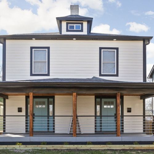 Exterior: Step into modern elegance with stylish architecture and inviting porch views!