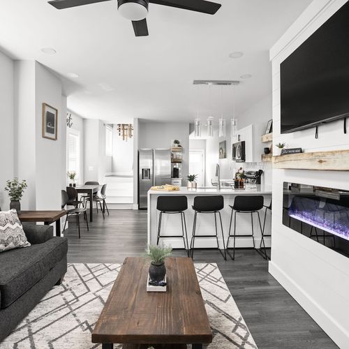 Living Room: Bright and airy space with stylish decor and modern amenities for a delightful stay!