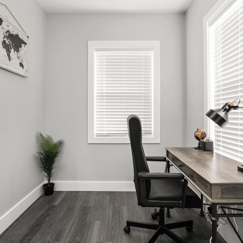 Office Retreat: Bright workspace with modern decor, perfect for focused productivity and inspiration!