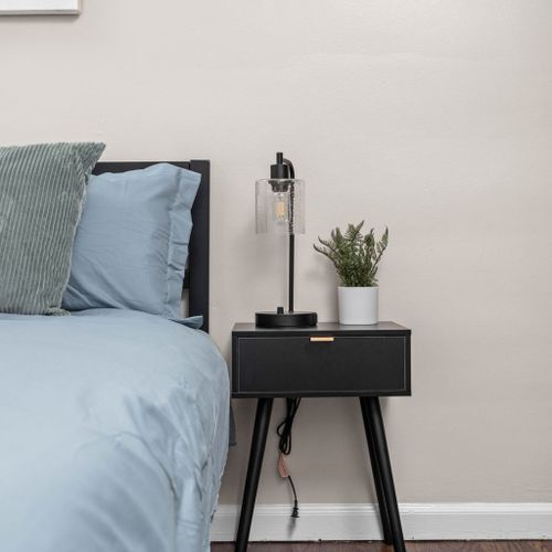 Complete your bedside setup with a functional bedside table and a soothing bedside lamp.
