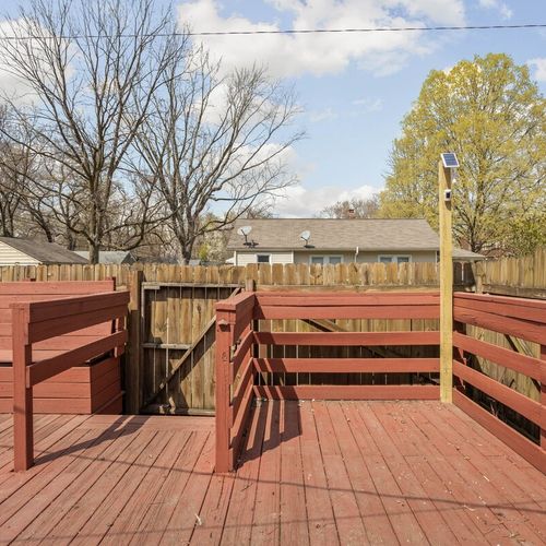 The charm of our backyard porch, providing a perfect spot to unwind and enjoy the outdoors.