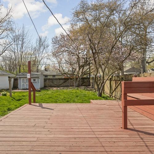 The charm of our backyard porch, providing a perfect spot to unwind and enjoy the outdoors.