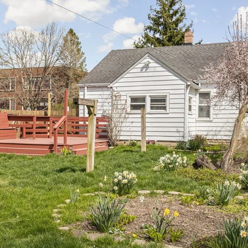 Enjoy the lush greenery of the backyard.