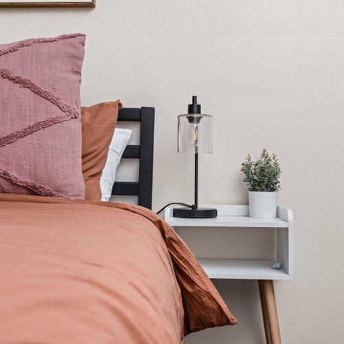 Complete your bedside setup with a functional bedside table and a soothing bedside lamp.