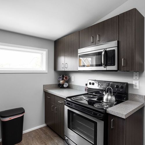 The microwave, stove, and oven are ready for your use.