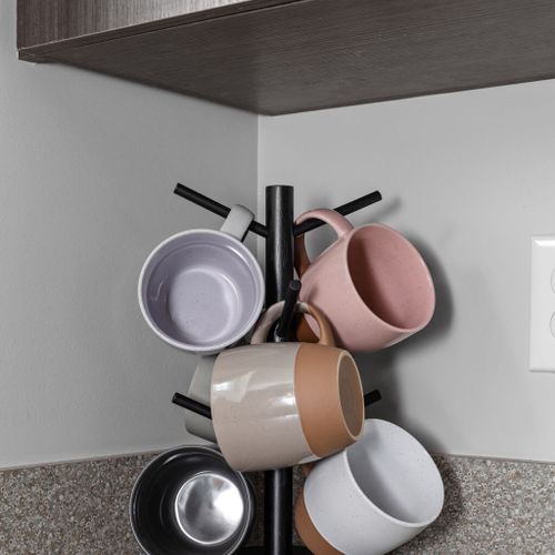Delight in a cup of coffee using our charming coffee mugs, adding an extra touch of warmth to your beverage experience.