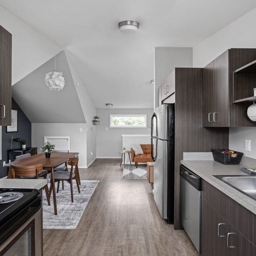 Experience our gleaming, clean kitchen, fully equipped with cooking essentials, utensils, and modern appliances for your culinary needs.