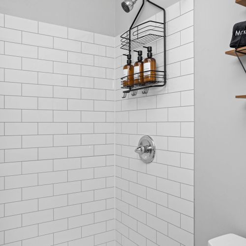 Indulge in our shower, fully equipped with shampoo, conditioner, and body wash for a refreshing and delightful bathing experience.