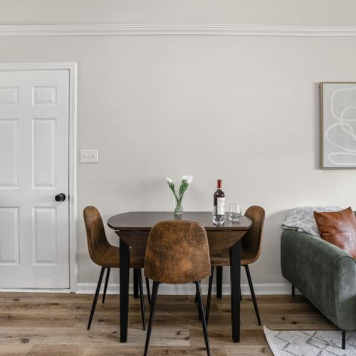 Our dining table is the perfect spot for enjoying food and snacks. Feel free to indulge and have delightful conversations in this inviting space during your stay.