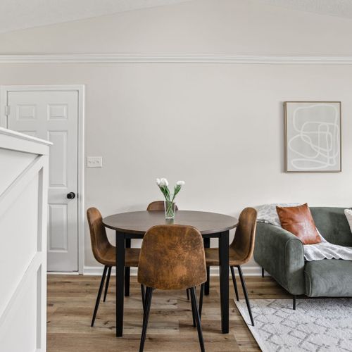 Our dining table is the perfect spot for enjoying food and snacks. Feel free to indulge and have delightful conversations in this inviting space during your stay.