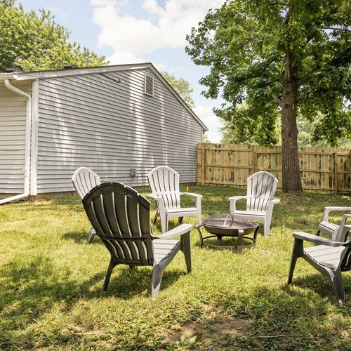 Take a moment to unwind by the fire pit and find a comfortable seat in our refreshing backyard. Enjoy the cozy atmosphere and make the most of your time in our outdoor space.