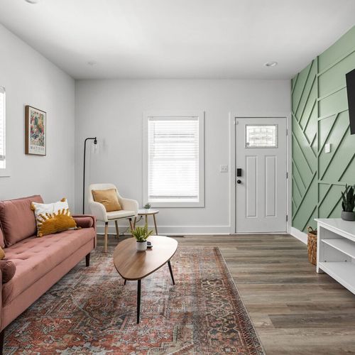 A space designed for relaxation, featuring a soft sofa bed, a coffee table, and a TV – the perfect setting to unwind and enjoy moments of comfort and entertainment.
