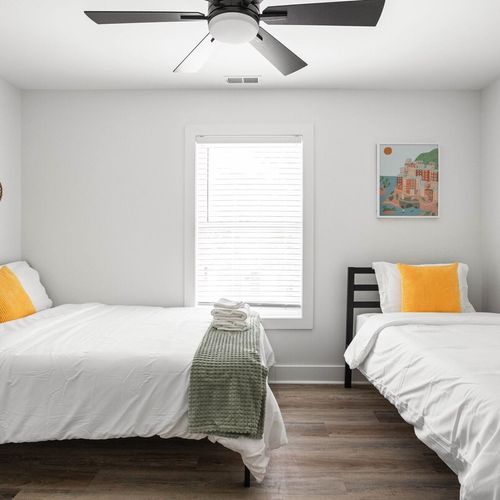 Enjoy the inviting warmth of our bedroom, complete with a double bed and a single bed, providing a flexible and comfortable sleeping environment.