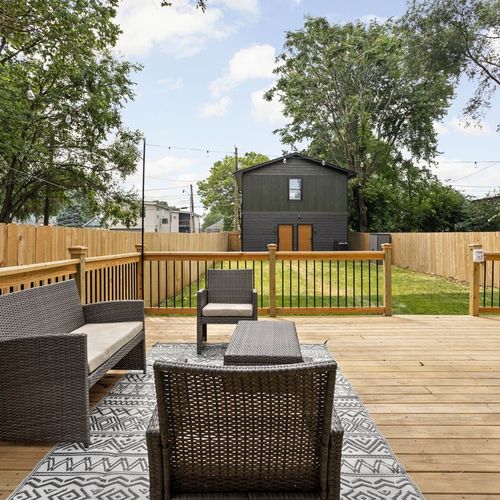 Step outside to our enchanting backyard – a space you'll absolutely love. Fenced for your safety, it's the perfect spot to have a seat, unwind, and relish in the invigorating freshness of the air. Make yourself at home in this peaceful retreat.